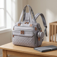 Sac fourre-tout Portable pour maman avec fonction double sac à dos, sac de maternité de grande capacité pour les essentiels de bébé et le rangement des couches, en situation