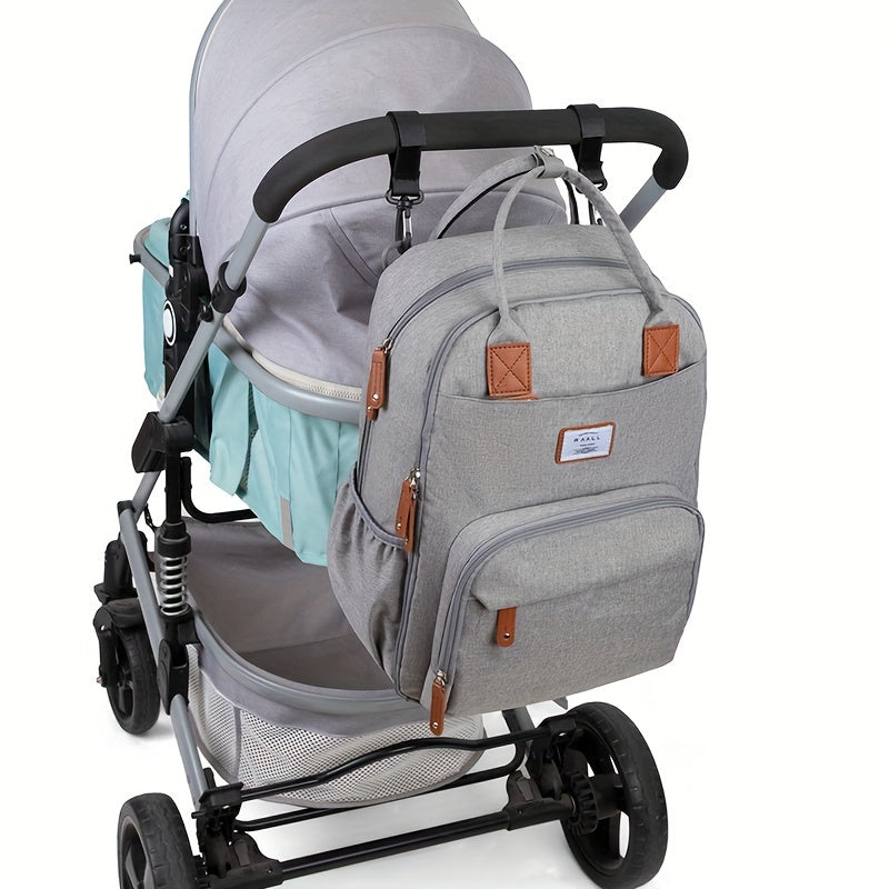 Sac à dos à langer, tapis et poche isotherme, 2 coloris