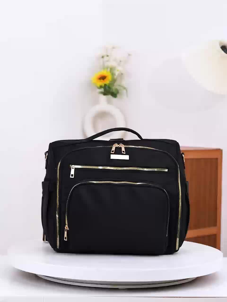 Sac à langer bandoulière format cartable, 2 coloris