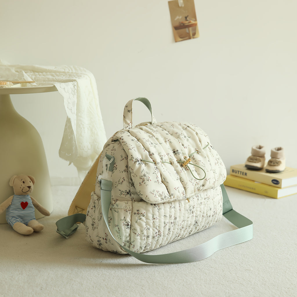 Sac à dos à langer matelassé à fleurs, se fixe à la poussette