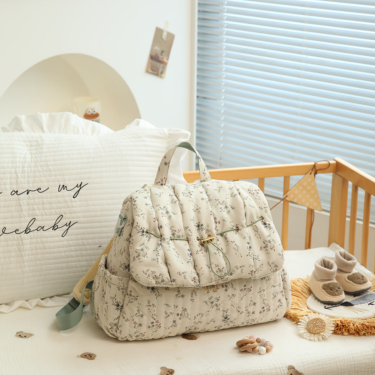 Sac à dos à langer matelassé à fleurs, se fixe à la poussette
