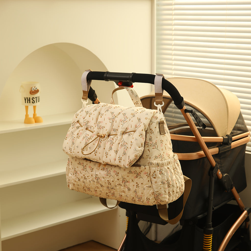 Sac à dos à langer matelassé à fleurs, se fixe à la poussette