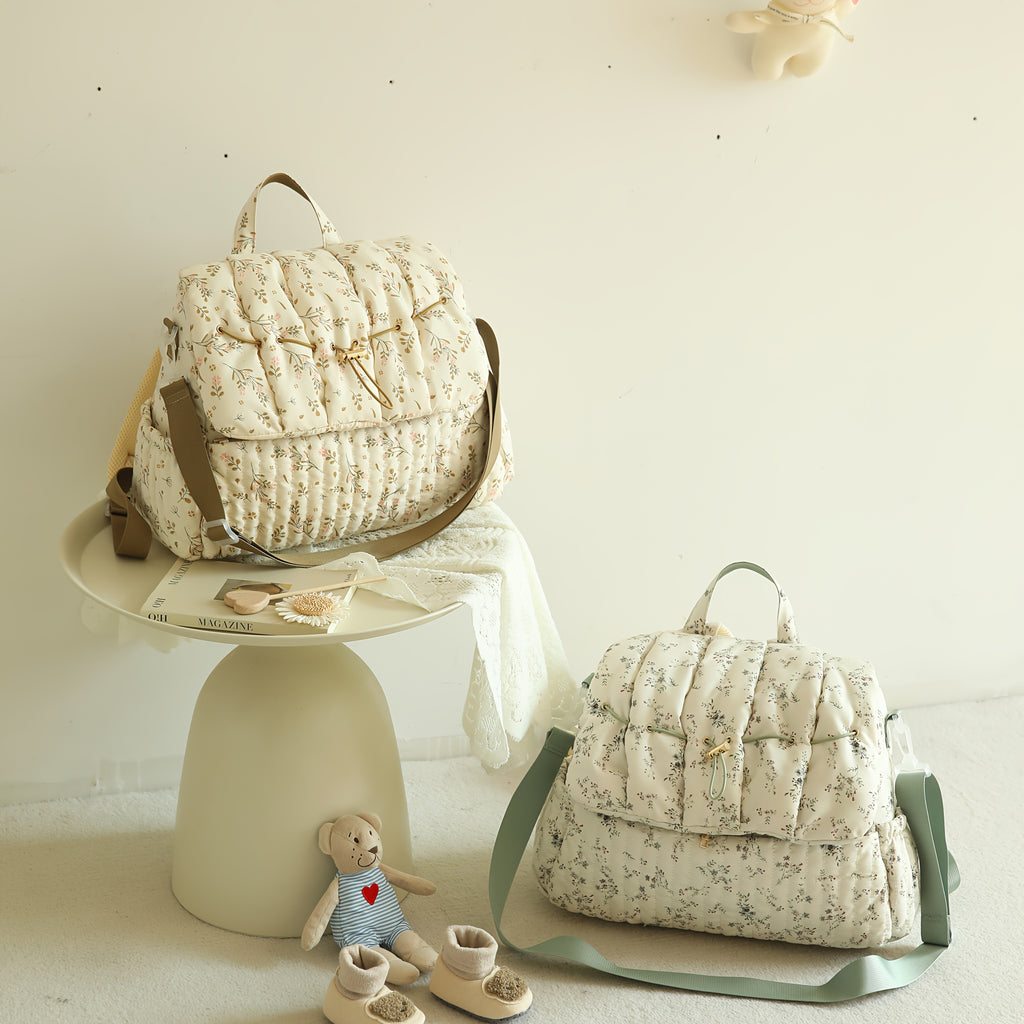 Sac à dos à langer matelassé à fleurs, se fixe à la poussette