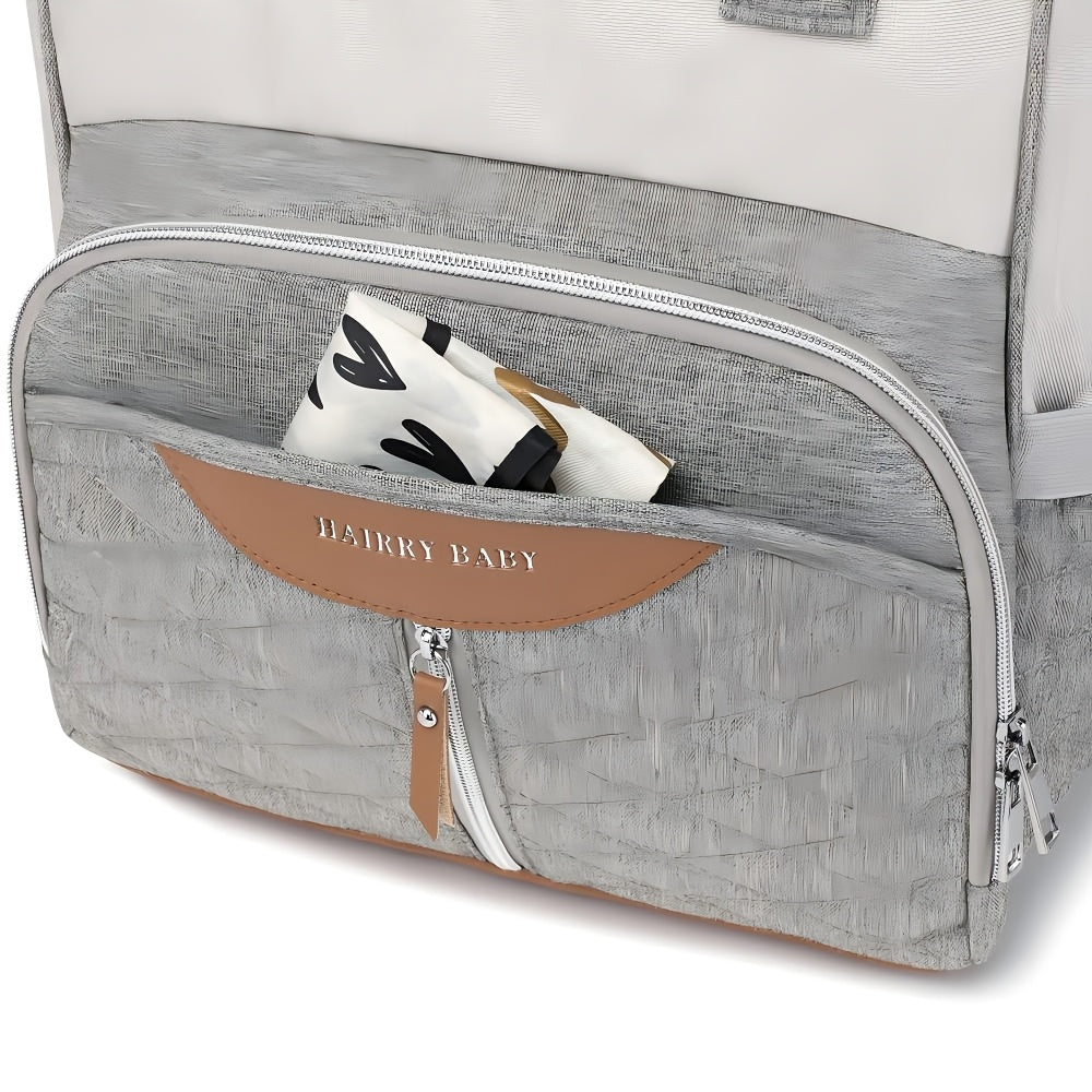 Sac à dos à langer, tapis inclus et sangles poussette, 4 coloris
