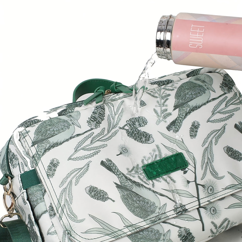Sac à langer bandoulière imprimé botanique, se fixe à la poussette