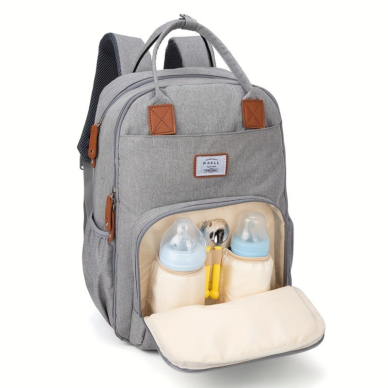 Sac à dos à langer, tapis et poche isotherme, 2 coloris