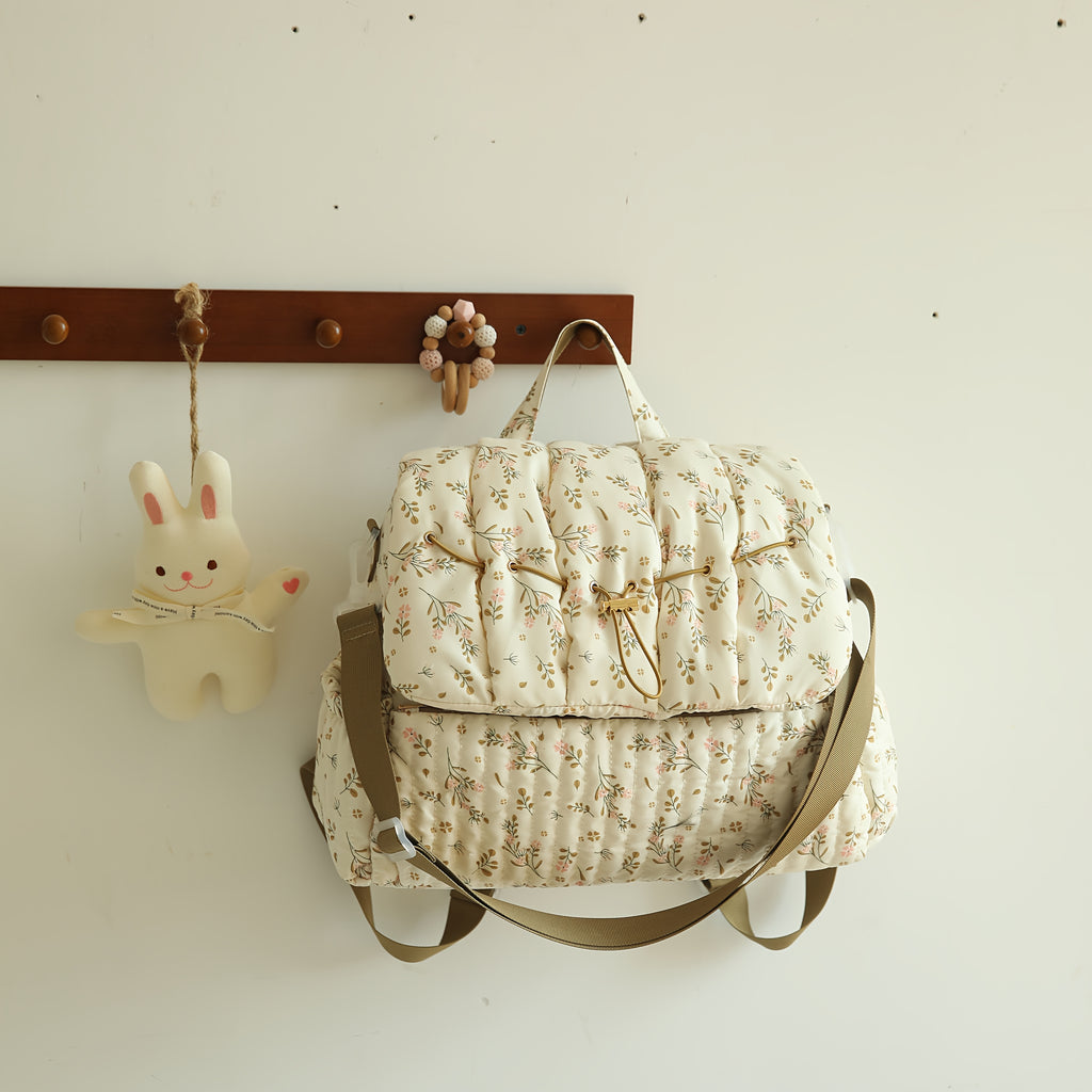 Sac à dos à langer matelassé à fleurs, se fixe à la poussette
